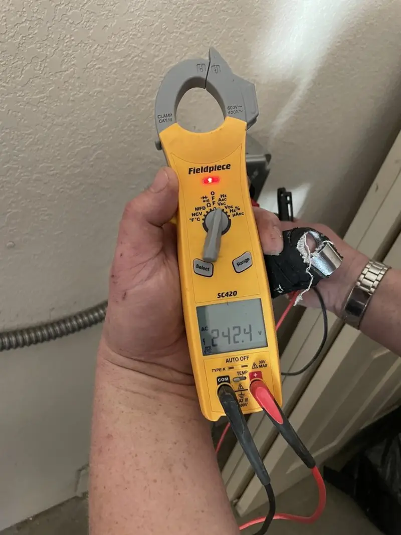 Voltage testing with clamp meter during Electrical Installation Services in El Dorado Hills